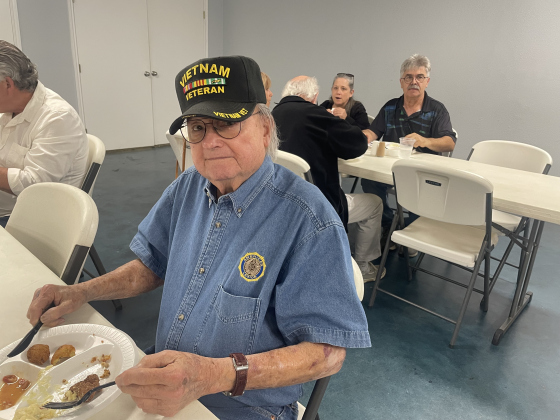  Phil Clark eats a meal of fried fish at the VFW on March 29. 