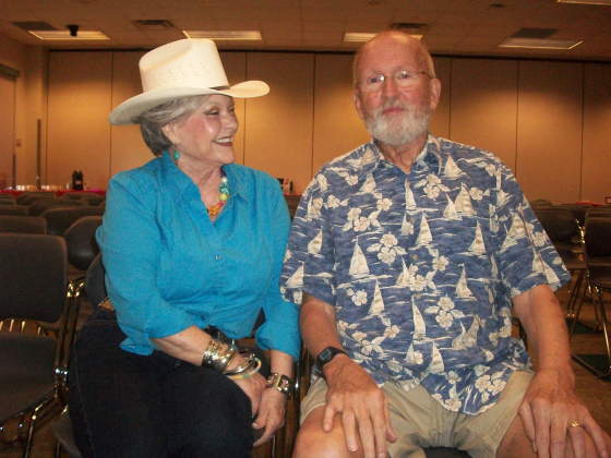 Peggy “Rowdy” Scarborough, from the Sun City duo of Rowdy & Ron, talks with Bob Moore, who came to the May 19 Camille’s Memory Café with his wife, Vicki.