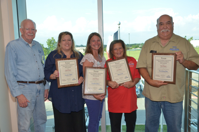 Photo from left to right: Dr. Wayne Schirner, Francine Erickson, Catherine Nickle, Judy Williams, President of the Williamson County Master Gardeners Association Bob Hinojosa pose with awards celebrating the group’s achievements with youth programs, research and teaching. Photo courtesy of the Williamson County AgriLife Extension Office.