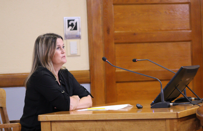 Sally Bardwell, Wilco’s Community Development Administrator, answers a question during the June 18 Commissioners Court meeting at the historic courthouse. The grants were brought before the court last week but were tabled due to some pending questions. Photo by Nalani Nuylan.