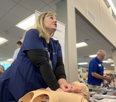 Kristen Hullum, the trauma injury prevention coordinator at St. David’s Round Rock Medical Center, demonstrates CPR and speaks on best practices. ST. DAVID’S ROUND ROCK MEDICAL CENTER