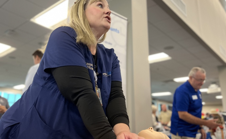 Kristen Hullum, the trauma injury prevention coordinator at St. David’s Round Rock Medical Center, demonstrates CPR and speaks on best practices. ST. DAVID’S ROUND ROCK MEDICAL CENTER